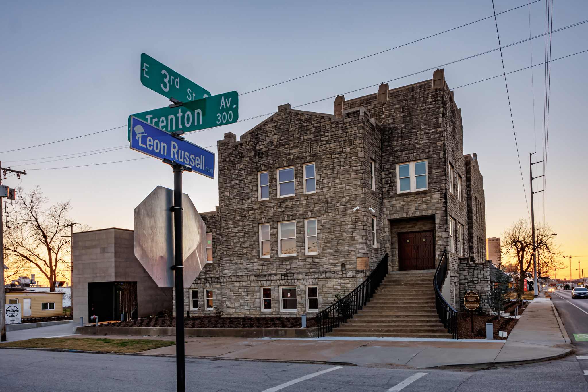 caption:Carney Fest honors the legacy of Leon Russell outside Tulsa's Church Studio, which he made famous, with a daylong festival of music and sideshow performers. Photo courtesy Phil Clarkin / The Church Studio