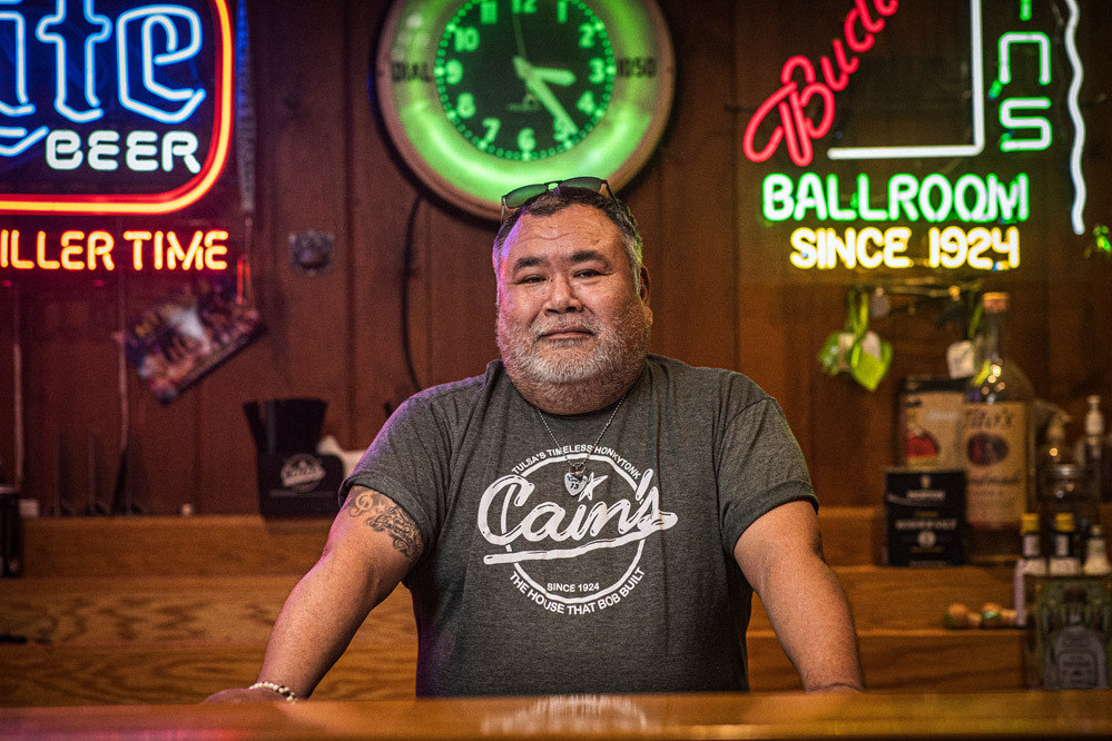 caption:Another veteran employee, bartender David Standingwater has been slinging drinks formore than twenty years. Photo by Shane Bevel