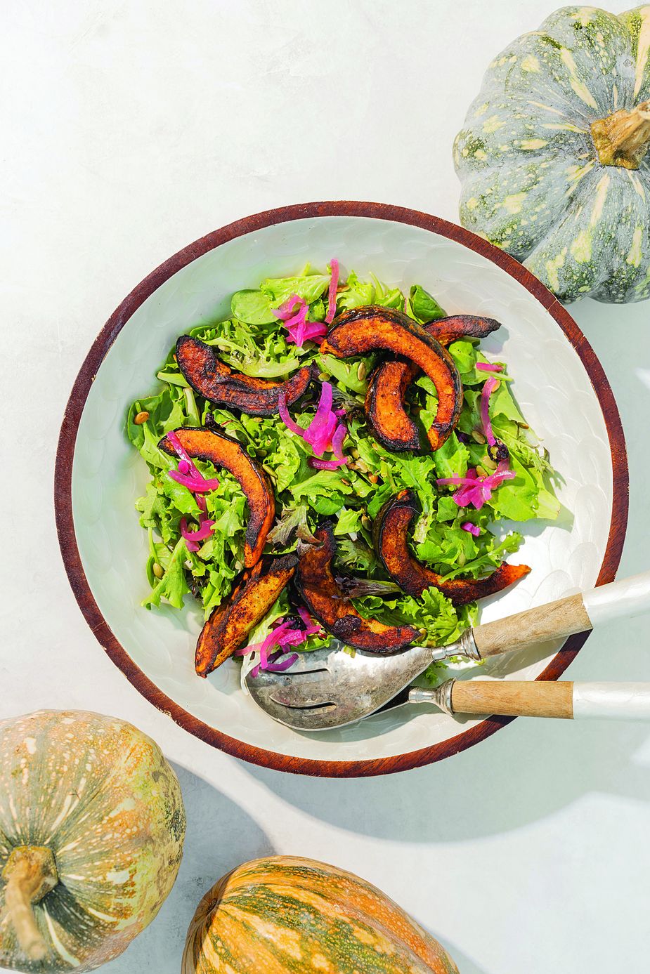 Chef Nico Albert Williams prepared this ancho and maple roasted acorn squash salad with pumpkin seeds, cranberries, pickled onion, and pumpkin vinaigrette. Photo by Valerie Wei-Haas