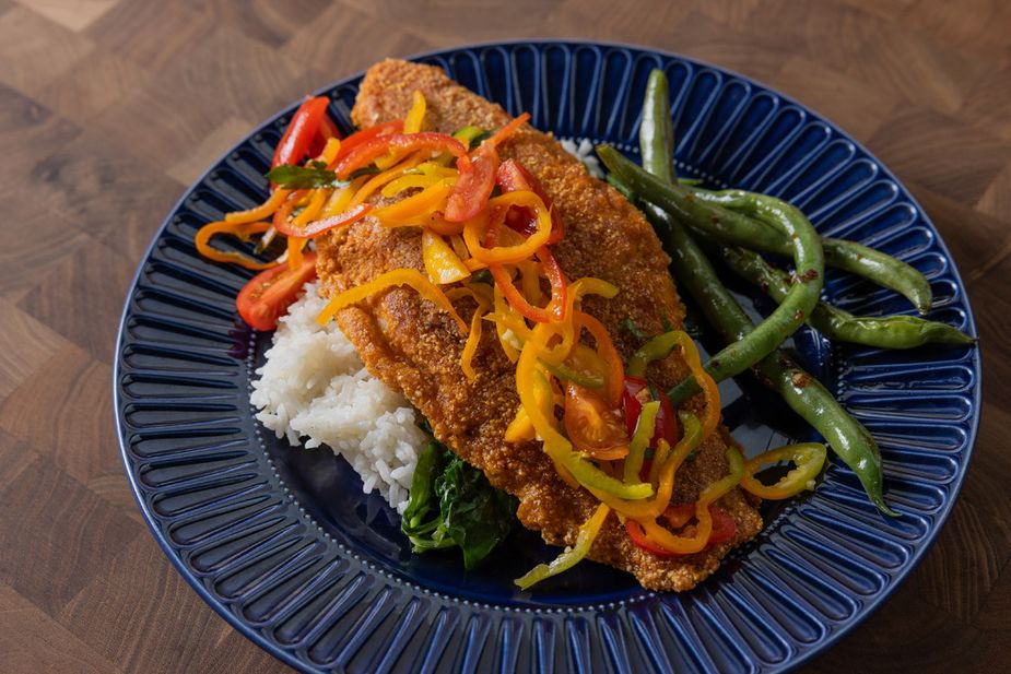 The crispy Oklahoma Griddle Fried Catfish at Cow and Cabbage in Tulsa is made with cornmeal breading. Photo by Valerie Wei-Haas