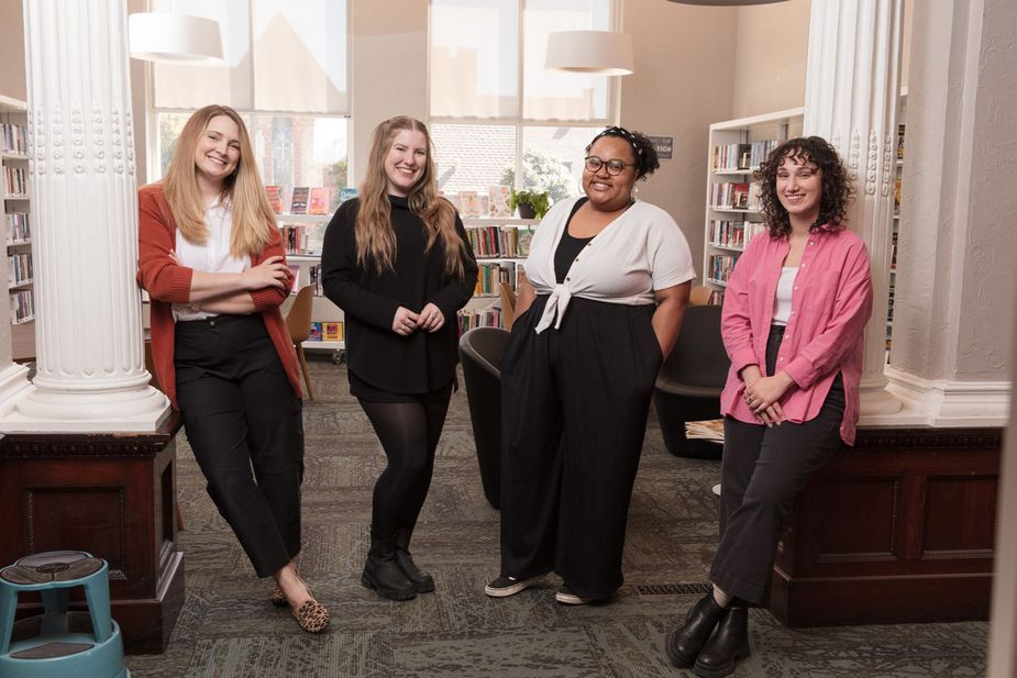 From left: Library director Bridget Scheffler, technical processor Leslie Hindman, teen/adult librarian Shae Frierson, and children’s librarian Maddie Razook in the El Reno Carnegie Library. Photo courtesy Brent Fuchs