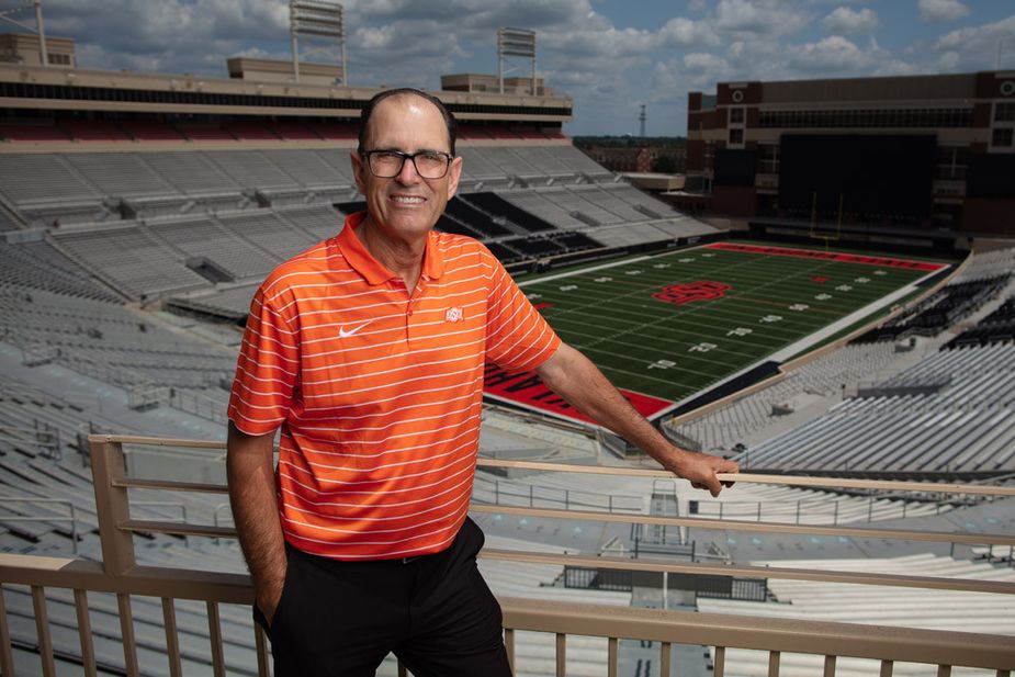 Dave Hunziker has been the “Voice of the Cowboys” for Oklahoma State University football and men’s basketball since 2001. Photo by Brent Fuchs