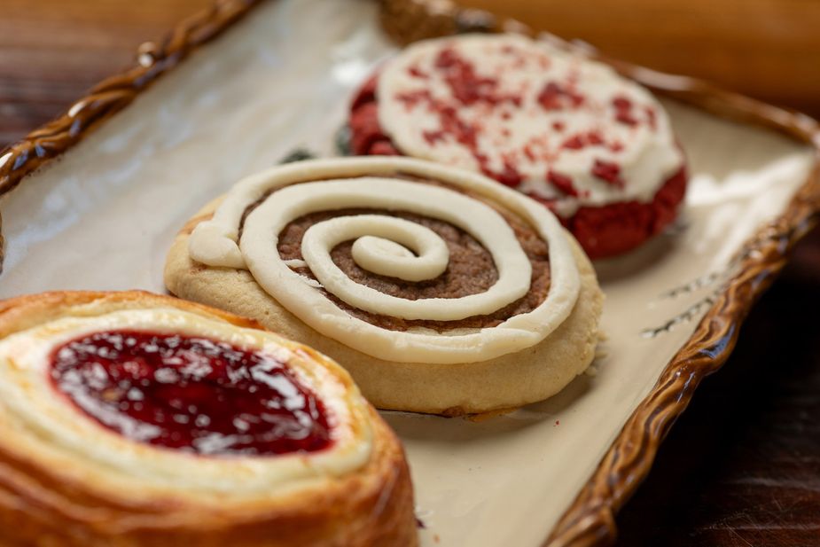 Baked goods and sweet treats look pretty behind glass at the register. Photo by Brent Fuchs