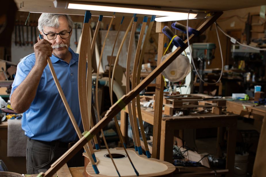 Travis Williams works on multiple batches of parts at once, but he completes about two-and-a-half instruments a year. Photo by Brent Fuchs