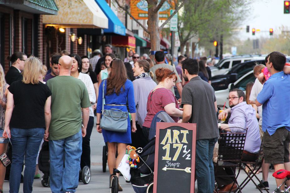 Hustle and bustle in downtown Norman is the default setting during the fun 2nd Friday Norman Art Walk. Photo by Norman Arts Council.