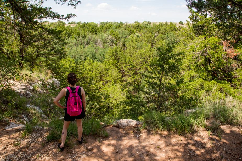 Megan surveys the wilderness at Alabaster Caverns State Park. Photo by Lori Duckworth