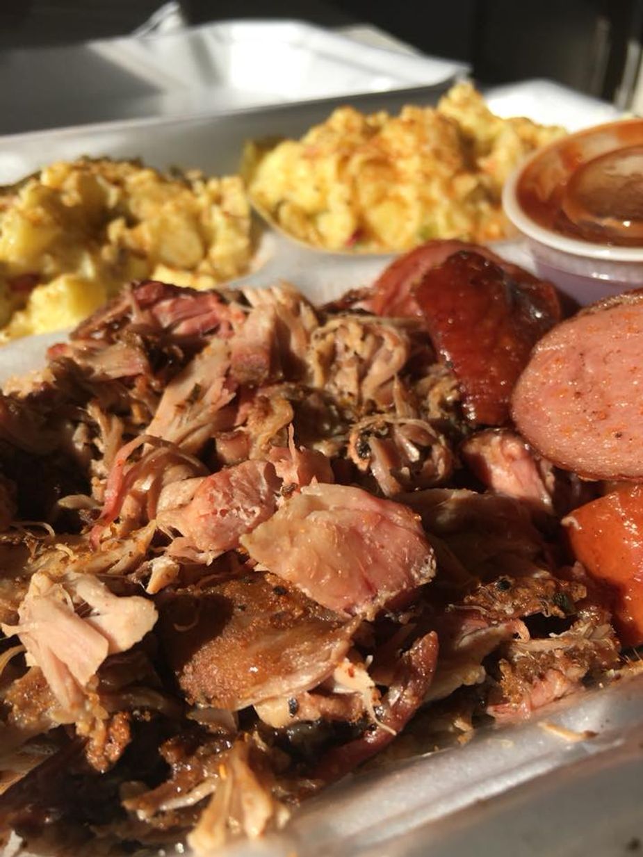 Two-meat plate with pulled pork, sausage, and potato salad from Blue Mountain Smoke.