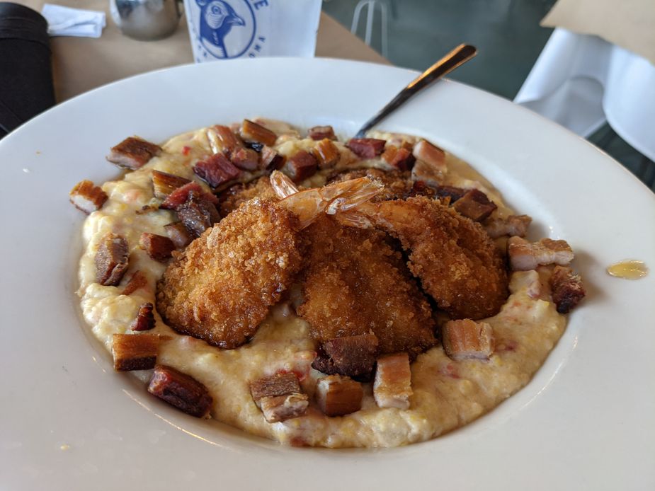 Bramble in Tulsa makes shrimp and grits with big chunks of smoky bacon to boost the savory flavor. Photo by Greg Elwell