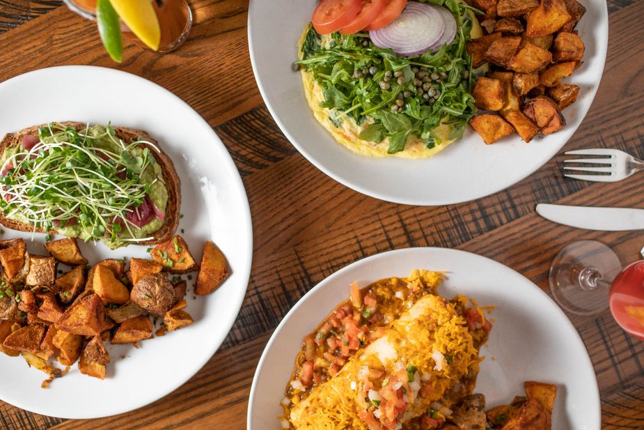 Brunch is a delicious and extravagant affair at Smoke in Tulsa. Pictured here are the restaurant's avocado toast, smoked brisket burrito, and smoked salmon scramble. Photo by Valerie Wei-Haas