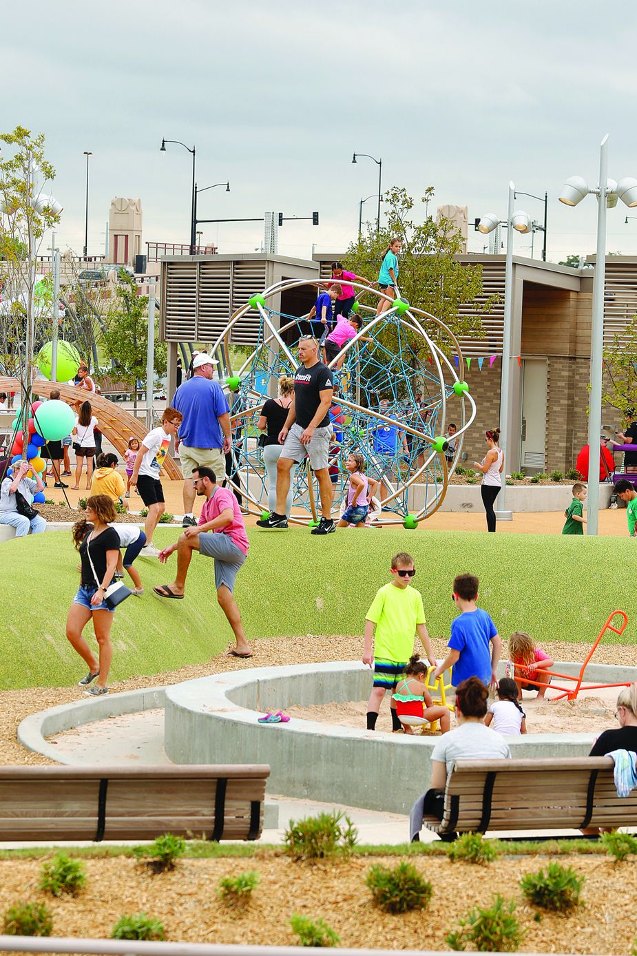 Open dawn to dusk, the Children’s Play Area includes a rock wall and ropes for climbing, a splash pad, various climbing structures, a large fort with slides, and a sand box. Photo by Doug Hoke