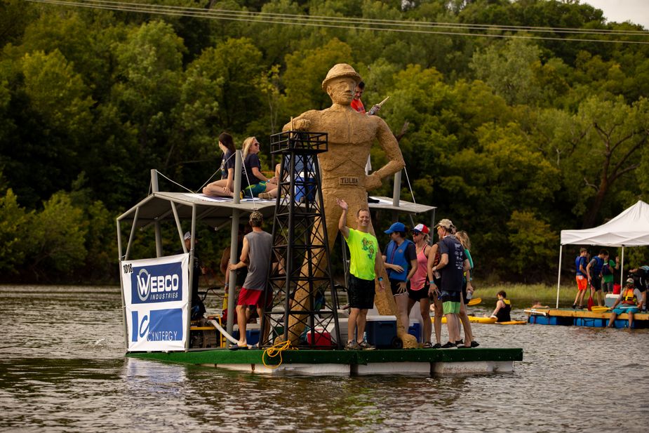 Competitors display their homage to the Golden Driller during the Great Raft Race in 2018. Photo provided by Great Raft Race.
