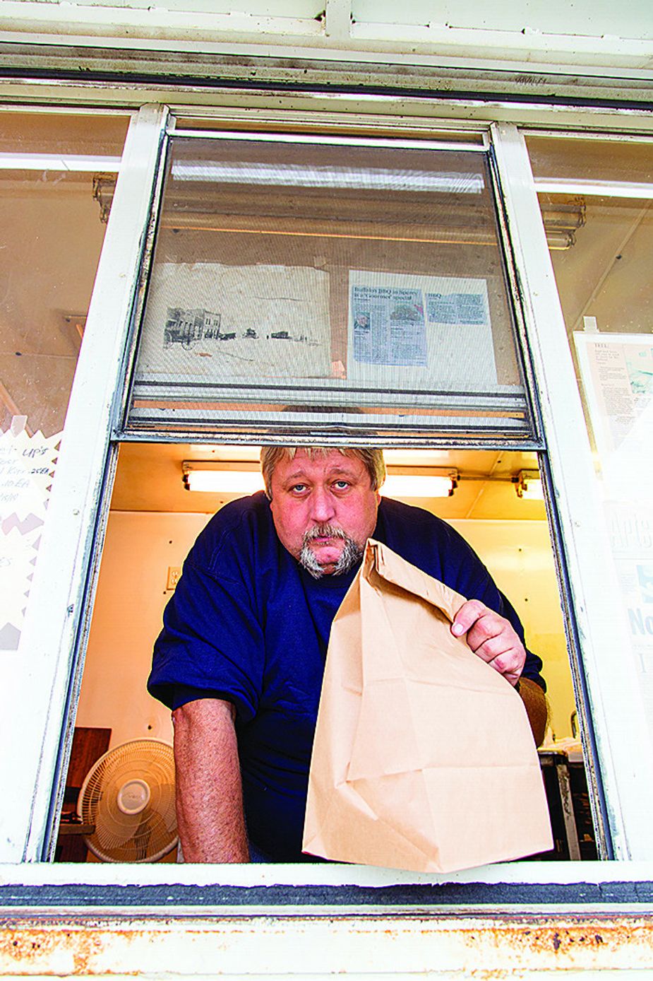 “People always talk about Kansas City barbecue and Texas barbecue,” says Buffalo’s BBQ owner Donny Teel. “I look at it as a sandwich. Texas is the bottom side of the bun, and Kansas City is the top side. All the good stuff’s in the middle. That’s us.” Photo by Lori Duckworth