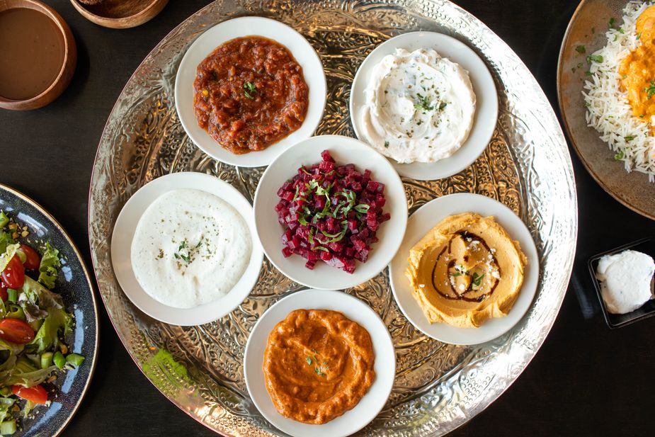 In Tulsa, Laffa Medi-Eastern Restaurant & Bar serves a variety of vegetarian-friendly cuisine. The Mezze Medley features a choice of salads, laffa and Greek pita breads, and savory dips. Photo by Valerie Wei-Haas