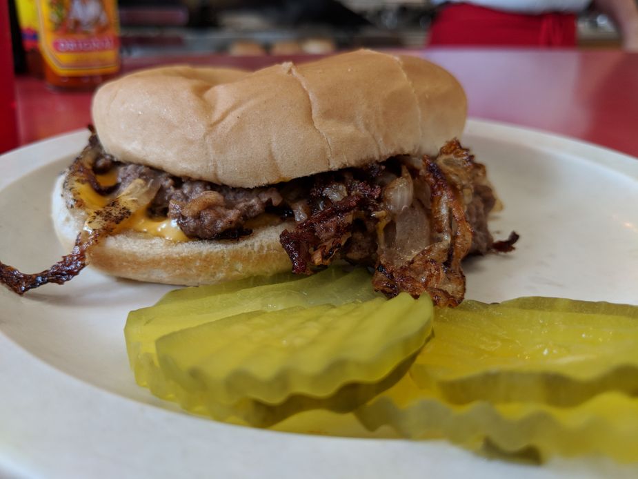 Bite into a piece of Oklahoma history when the El Reno Fried Onion Burger Day Festival serves up this classic Sooner State original. Photo by Greg Elwell