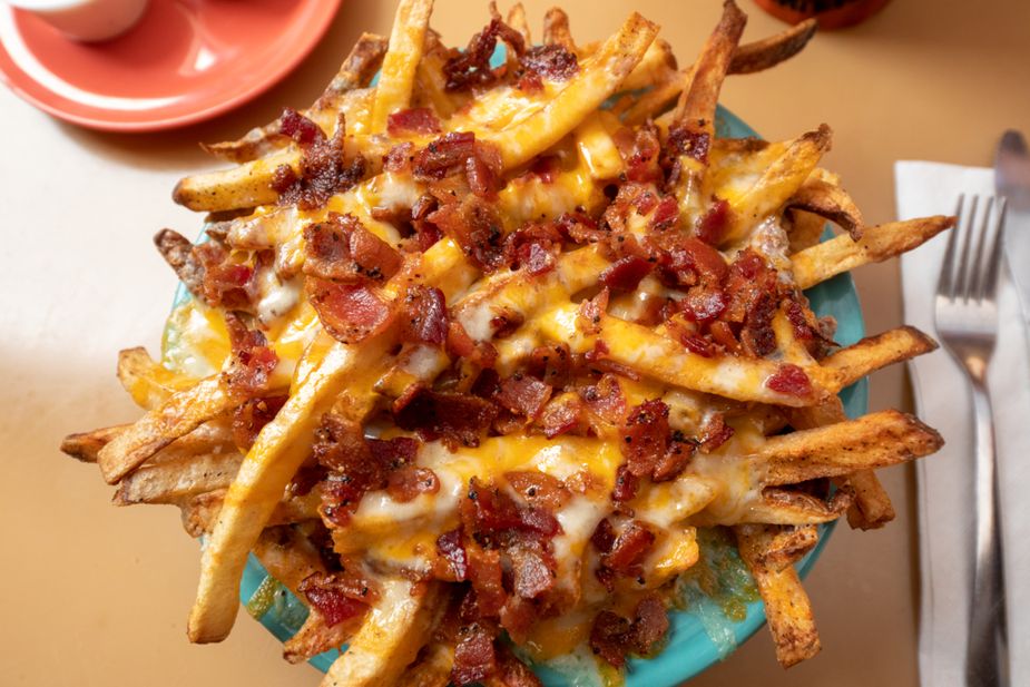 If you head out to enjoy the Eskimo Joe's 49th Anniversary Celebration in Stillwater, don't leave without ordering a plate of the famous cheese fries. Photo by Lori Duckworth/Oklahoma Tourism