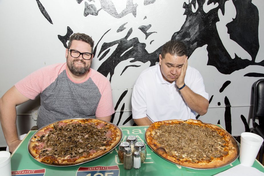 Greg and Addis Ochoa get ready to stuff themselves at Papa Angelo's in Bethany. Photo by Lori Duckworth