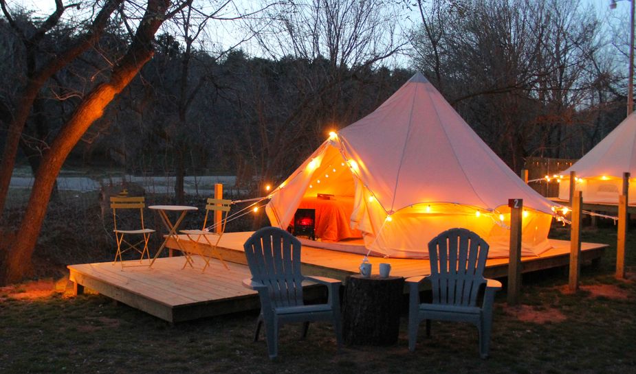 Warm outdoor lighting outside the glamping area makes every stay memorable. Photo courtesy Rhesa Funk/Funk Advertising