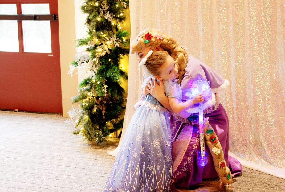 Make precious moments with your young one by attending one of the Princess Holiday Balls this weekend at Oklahoma City's Gaillardia Country Club. Photo courtesy Character Connection Co.