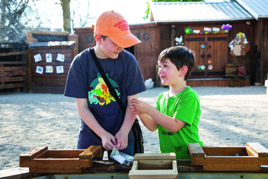 Visitors of all ages can mine for gems, rocks, fossils, and more—and learn about geology in the process—at the Beavers Bend Mining Company. Photo by Lori Duckworth