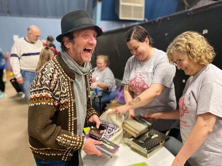 Even the Chainsaw Kittens' Tyson Meade, pictured, knows the Friends of the Metropolitain Library System Annual Book Sale is the best. The event returns to Oklahoma State Fair Park this Friday and Saturday. Photo courtesy Friends of the Metropolitain Library System