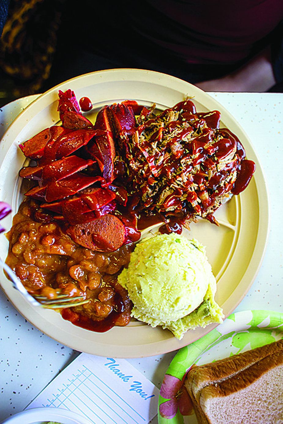 “We don’t have all the flash and dash of some of the commercial restaurants,” says John & Cook’s Real Pit BBQ owner Lonzo Gaines. “This is a family-owned business, and you’re going to get what you pay for.” Photo by Lori Duckworth