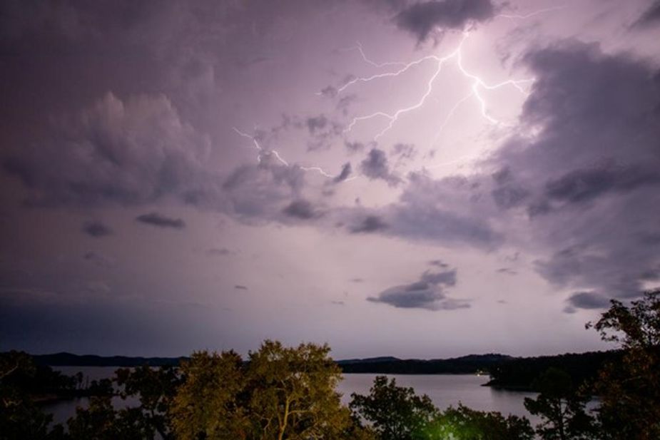 Lightning ignites the sky over Broken Bow Lake at Beavers Bend State Park in Hochatown. Photo by Lori Duckworth