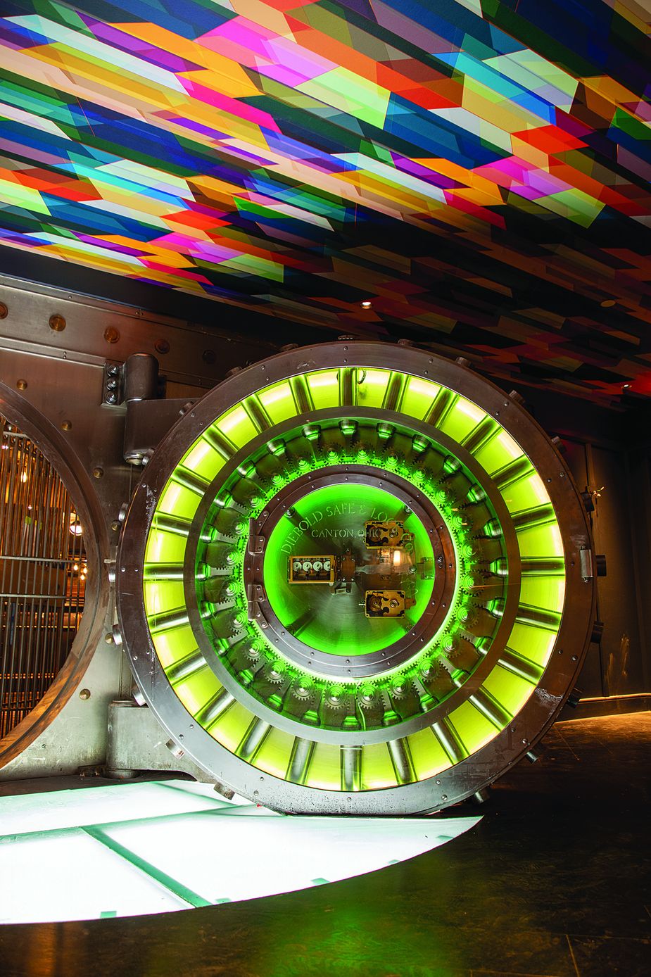 First National Center’s former bank vault, located in the basement, now houses The Library of Distilled Spirits, which specializes in classic cocktails and fine liquors. Patrons enter through the vault doors.