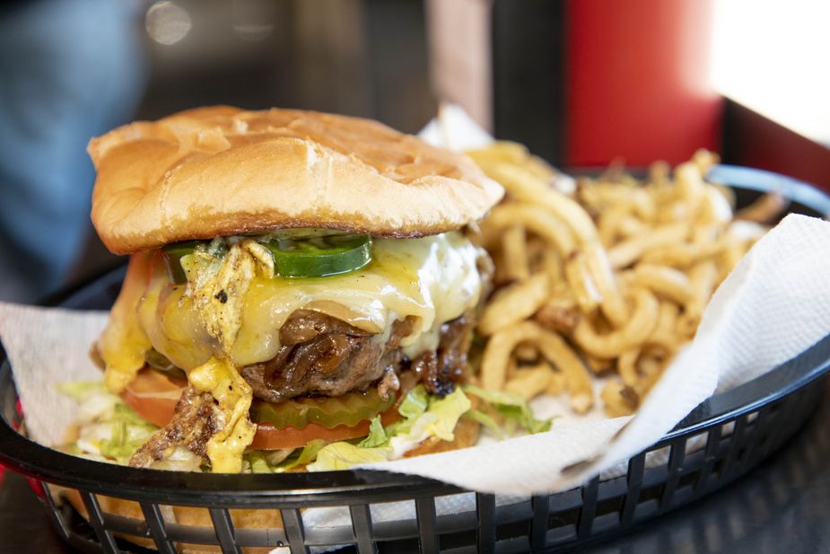 If you’re eating at the famous Nic’s Grill in Oklahoma City, be prepared to get a to-go box—and plenty of napkins. Photo by Lori Duckworth