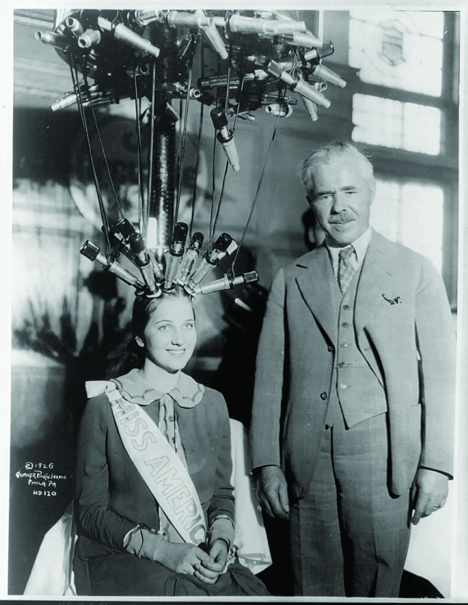Norma Smallwood tries out Charles Nessler’s new permanent wave machine in October of 1926. Photo courtesy Library of Congress