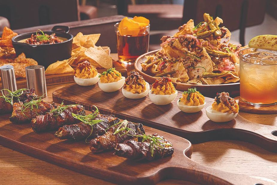 From brisket-topped deviled eggs to trash can nachos, Smokehouse Social has a barbecue dish for every taste. Photo courtesy OKANA Resort & Indoor Waterpark