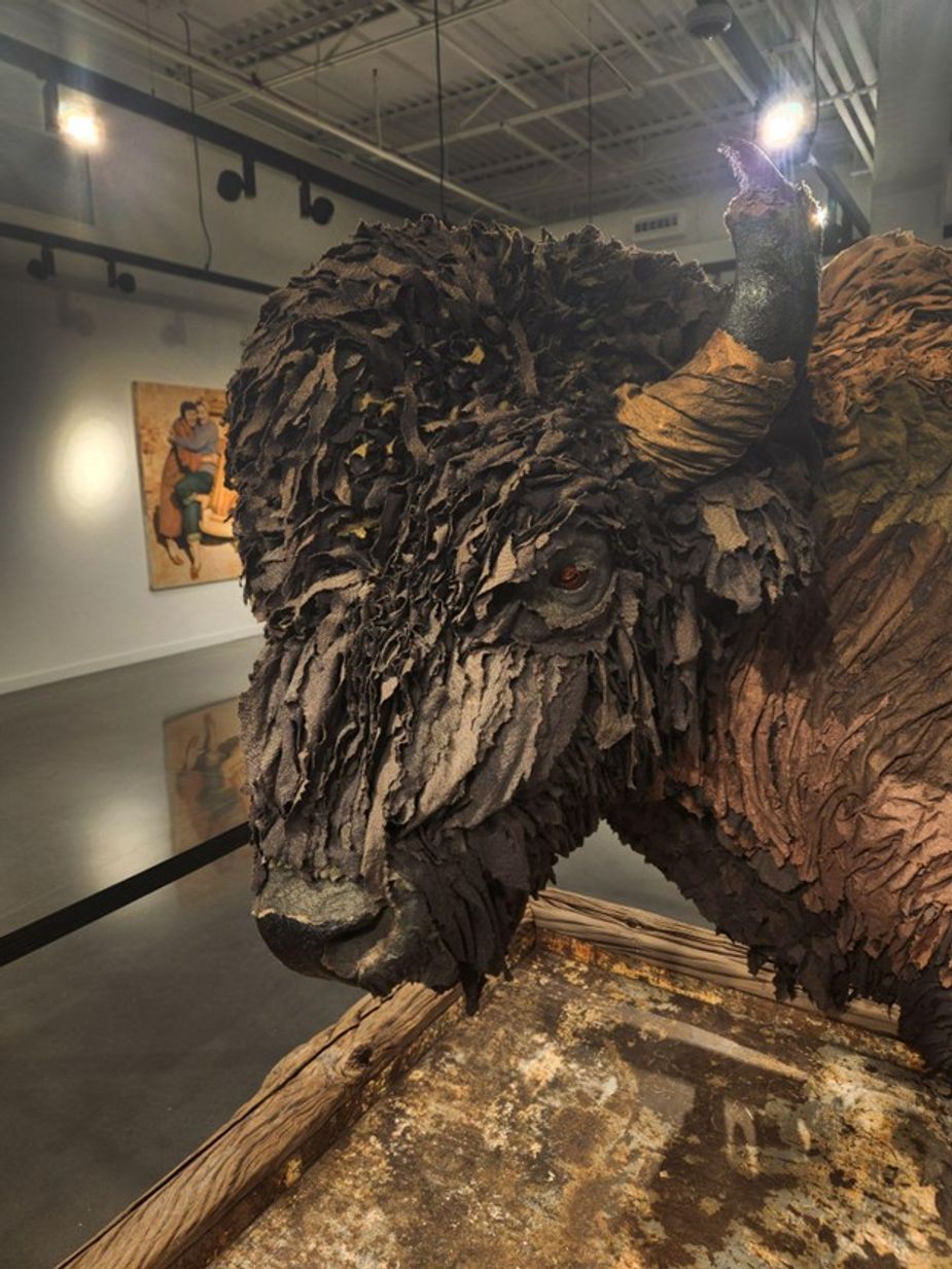 Windswept by Regina Free (Chickasaw); paper towels, reclaimed railroad ties, and metal sheets; life-sized bust of a bison