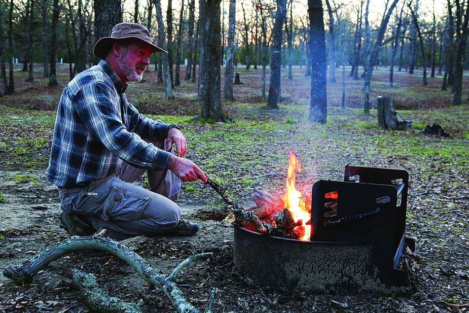 Bill Dragoo takes a dinner break at Boggy Depot Park near Atoka, which offers plenty of camping and RV sites.