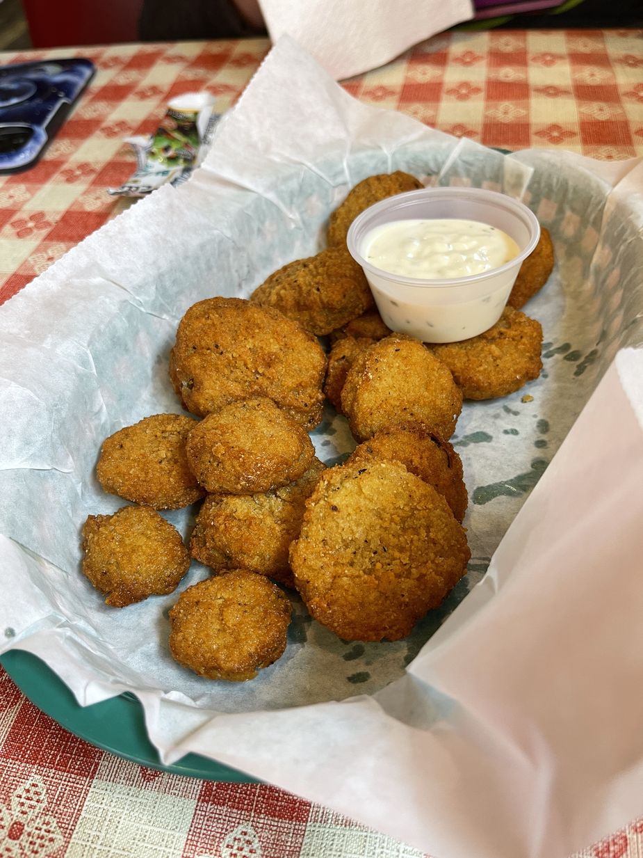 Railhead BBQ serves perhaps the perfect fried pickles—crispy, juicy, and greasy. Photo by Nathan Gunter