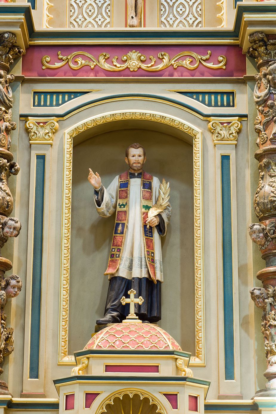 Blessed Stanley Rother's likeness is the centerpiece in a *retablo* that overlooks the church's sanctuary. Photo by Brent Fuchs