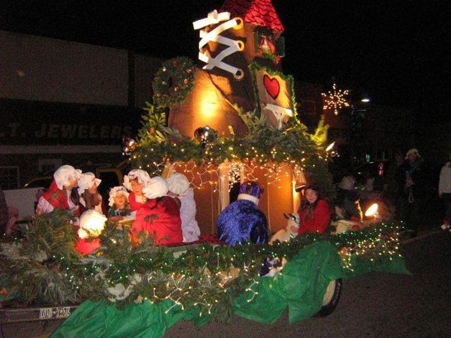Enjoy festive floats during Grove's annual Lights on the Lake parade.
