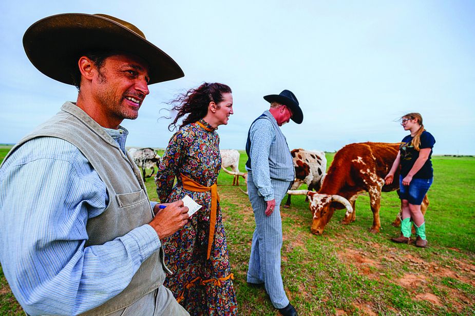 Reid and ladypal Kim step back in time and into throwback Western duds at the Davis family’s ranch in Hitchcock.