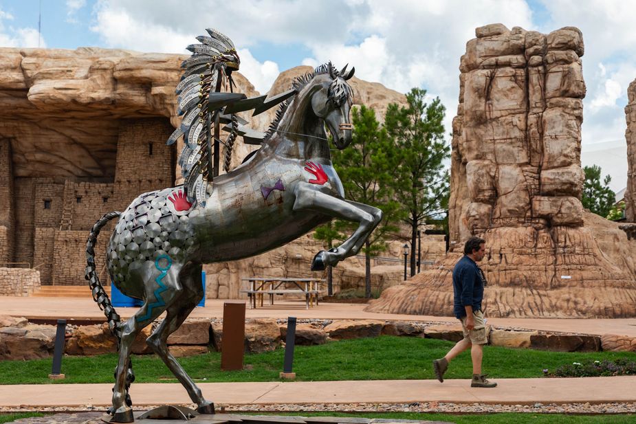 A Puebloan village is one of several buildings that make up the 100,000-square-foot outdoor Liichokoshkomo’ exhibit. Photo by Saxon Smith