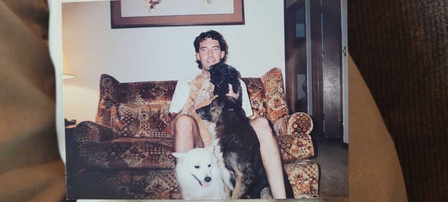 Dad with Bo, Taz, and some other animals I don't remember the names of, circa 1987.