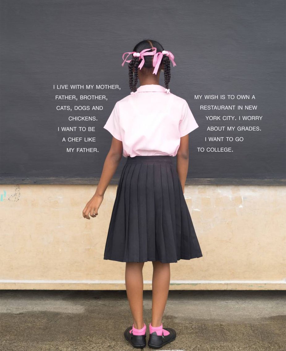 This fourth grade student from St. Lucia is one of many young people featured in The Fourth Grade Project, now on display at the Cherokee Strip Regional Heritage Center in Enid. Image courtesy The Fourth Grade Project