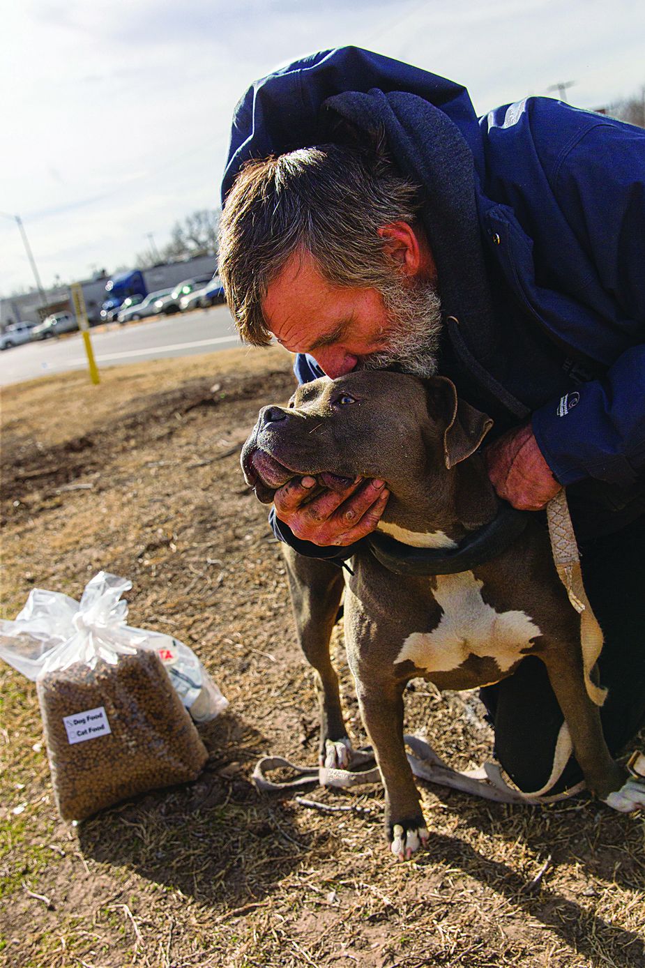 The Pet Food Pantry of Oklahoma City provides nearly 3,000 pounds of dog and cat food at bimonthly homeless outreach events. Photo by Brent Fuchs