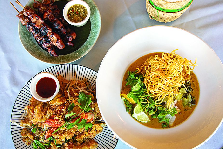 Moo ping skewers, hoy tod (crispy green mussels fried in egg), and khao soi (chicken curry broth with noodles) are among the most popular dishes at Oklahoma City's Thai House. Photo by Lori Duckworth