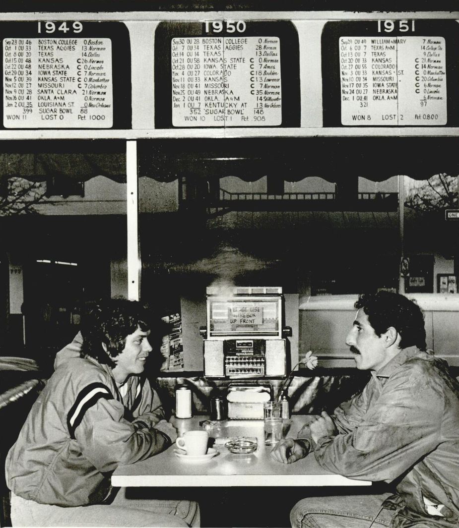 Patrons Benny Pain and Mark Reed wait for a burger at Norman's Town Tavern. Photo courtesy Oklahoma Historical Society