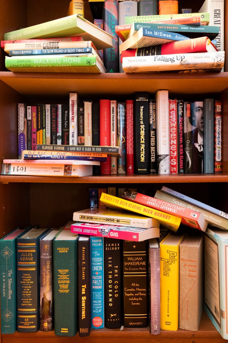 What does a bookcase full of unread books mean? You might be "tsundoku." Photo by Lori Duckworth.