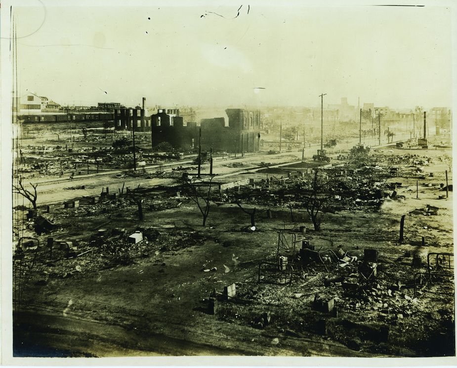 Chimneys, bed frames, and the shells of burned-out buildings were among the few things left standing throughout the neighborhood known as Black Wall Street following the 1921 Tulsa Race Massacre. Photo courtesy of Tulsa Historical Society