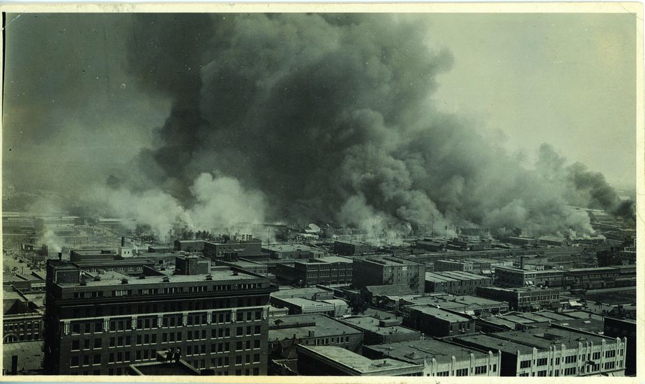 This photograph was taken from the roof of what was then the fourteen-story Cosden Building in downtown Tulsa—now the Mid-Continent Tower—during the Tulsa Race Massacre. Photo courtesy of Tulsa Historical Society