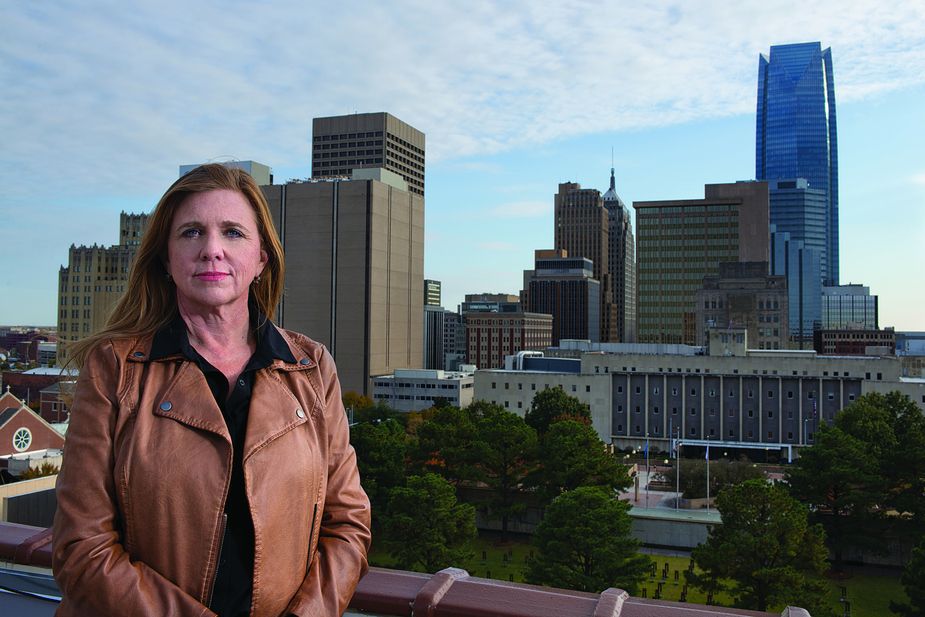 Carrie Hulsey-Greene, photographed atop what in 1995 was the Journal Record building and now houses the Oklahoma City National Museum, was one of the first journalists on the scene on the morning of April 19, 1995. Photo by John Jernigan.