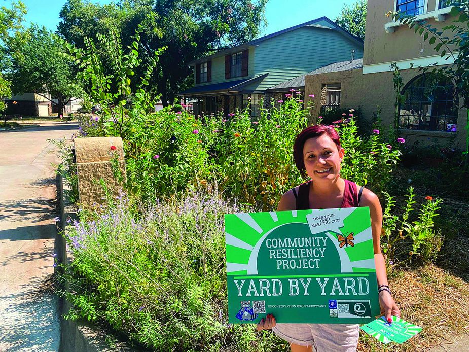 Yard by Yard-certified homeowners—like Kristen Amon of Oklahoma City, here—receive signs, wildflower seed packets, and recognition on Facebook. Photo courtesy Yard by Yard