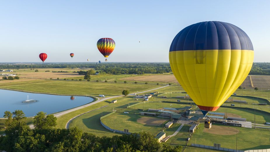 There's no sight quite like a field and sky full of coloful hot air balloons. One of the best shows around is the FireLake Fireflight Balloon Festival, returning to the Shawnee area August 8-9.