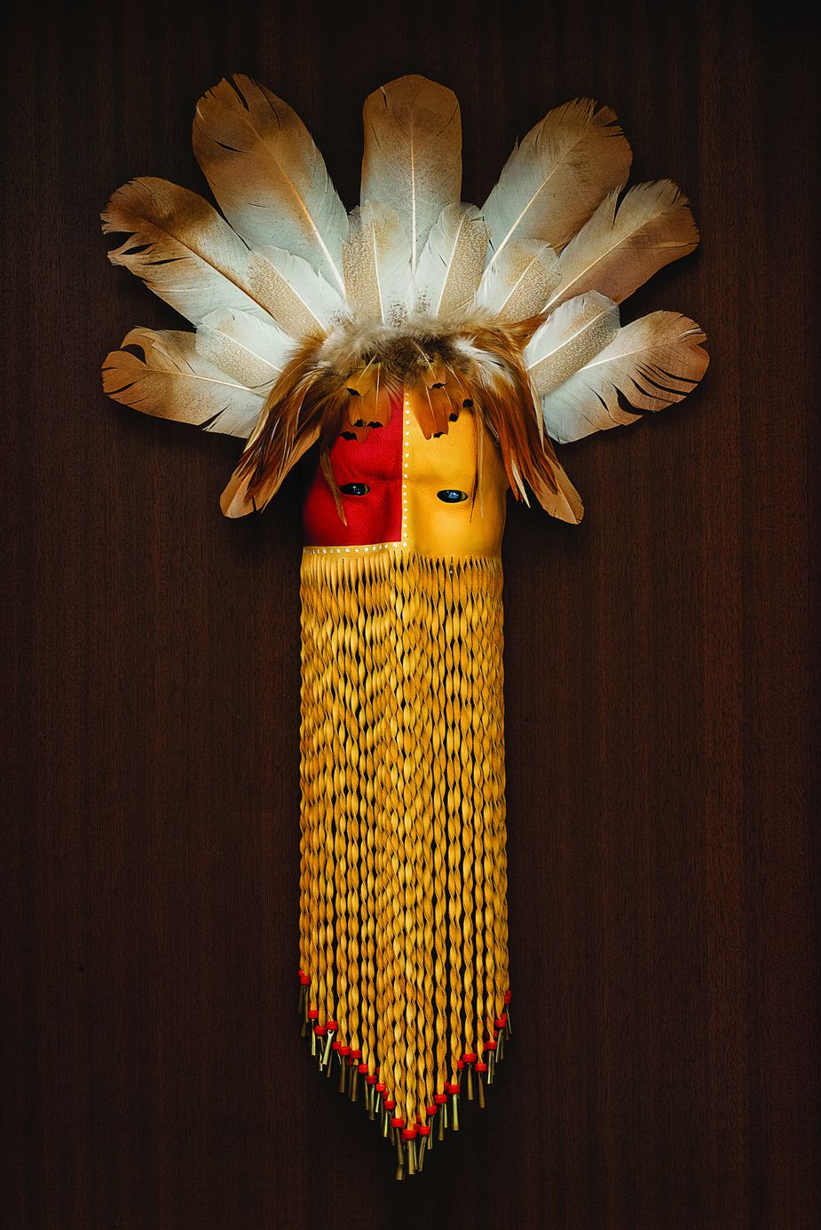 Three unique masks by Cherokee artist Dan Corley are on display at the center. Each begins with a clay mask, which he covers with leather before adding paint, beads, and feathers. Photo by John Jernigan