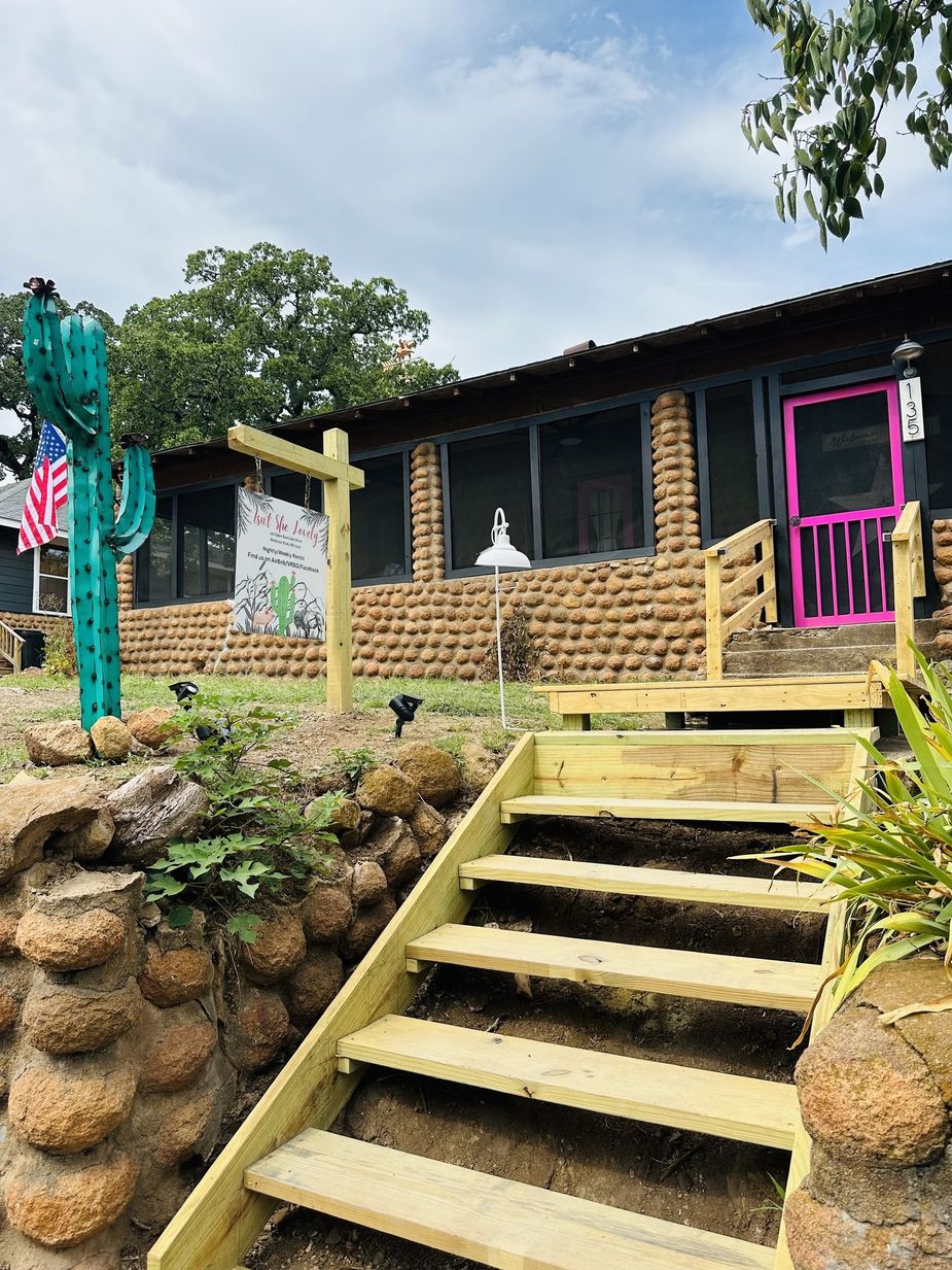 The cobblestone exterior of the Isn't She Lovely cabin makes it a perfect fit in the Medicine Park community. Photo courtesy Lisa Anshutz